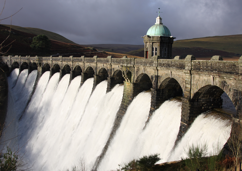 Craig Goch Dam in the Elan Valley with water in full flow
