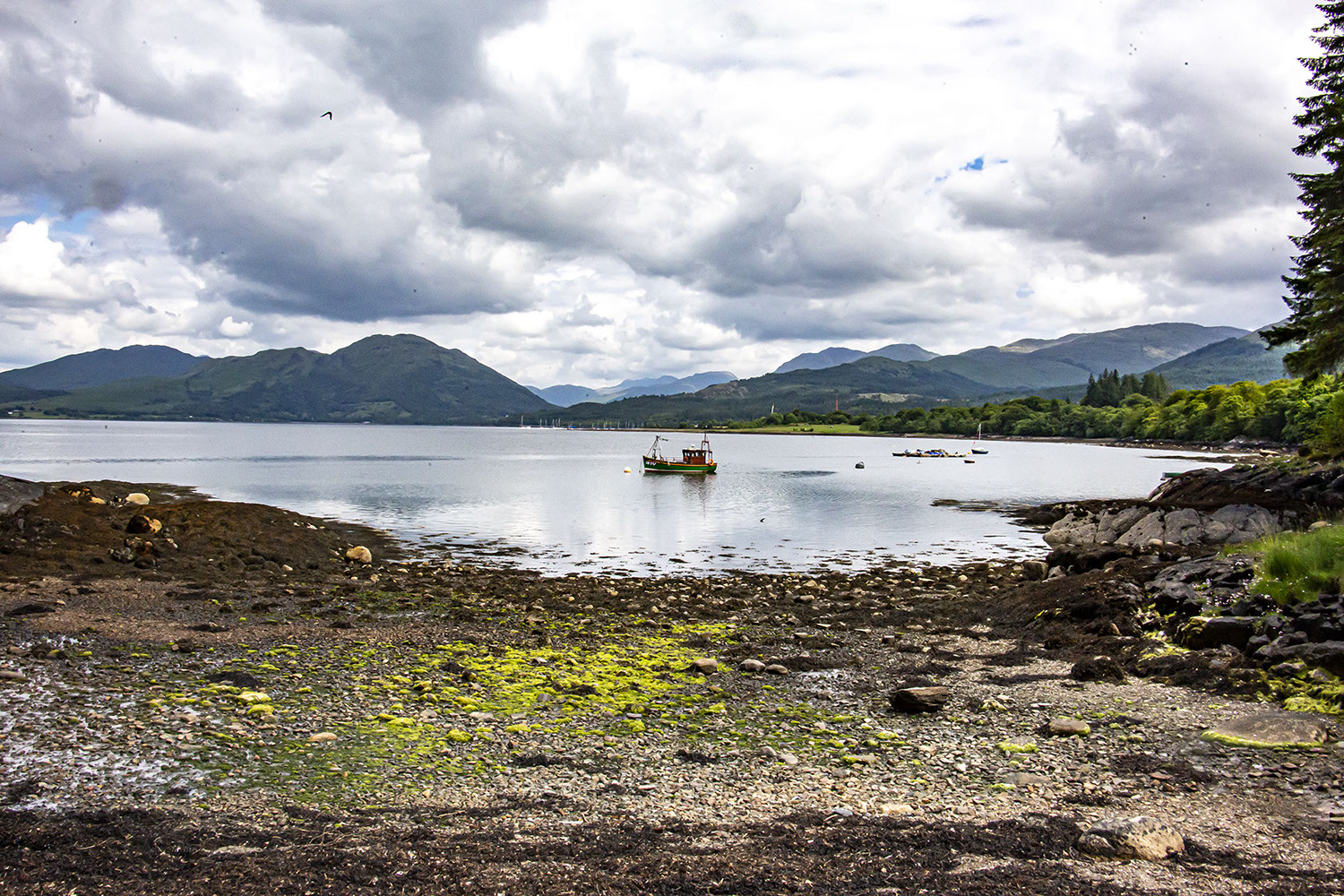 Small fishing boat on Scottish Loch