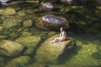 Australia, Cooling off in a tropical rainforest river.